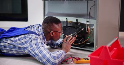 Appliance Repair in Progress